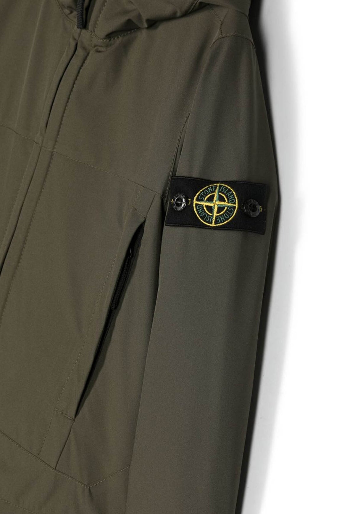 Giubbino bambino Stone Island verde in tessuto tecnico