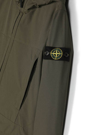 Giubbino bambino Stone Island verde in tessuto tecnico